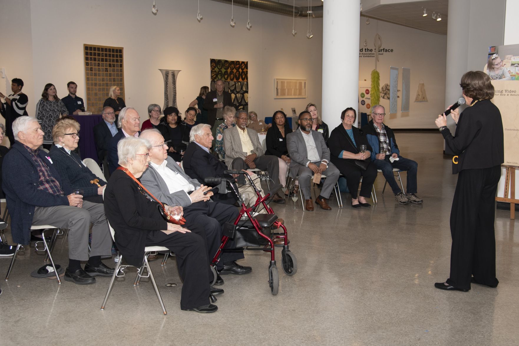 Founder Marylen Mann speaking at the Oasis Beyond Books celebration